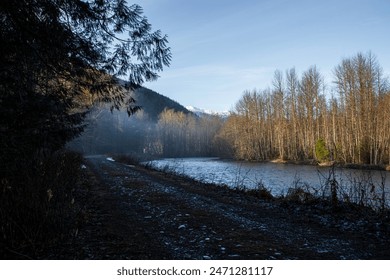 Cheakamus River, British Columbia, Canada, gloomy, morning, landscape, misty, foggy, river, tranquil, serene, peaceful, atmospheric, moody, cloudy, overcast, mist, fog, forest, trees, evergreens, wild - Powered by Shutterstock