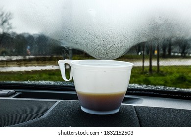 Cheap Coffee From A Gas Station Giving Off Steam On The Car Window