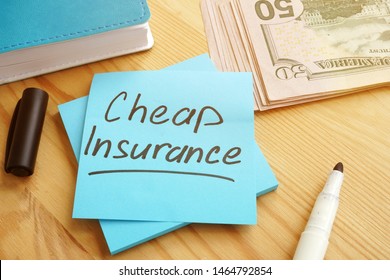 Cheap Insurance Concept. Money And Notepad With Pen.