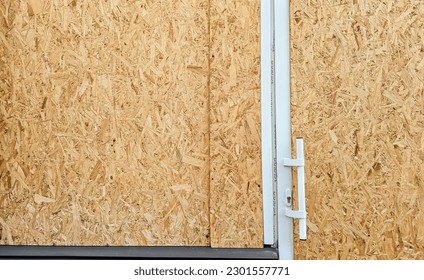 Cheap Price Wood Panels. Particle board made of wood chips .Top view. osb board  texture. - Shutterstock ID 2301557771
