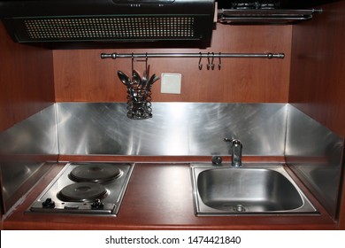 Cheap Tiny Fitted Chipboard Kitchen: Sink, Electronic Stove, Range Hood, Cutlery Dryer, Hooks For Towels. Furniture For A Small Room.