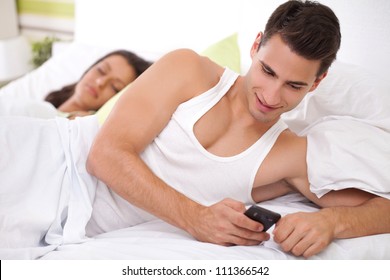 Cheating His Wife, Young Men Chatting With His Mistress While His Wife Sleeps