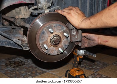 Check brake system of car - Shutterstock ID 1933850657