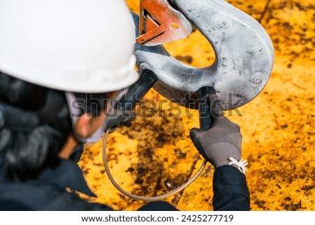 Check for cracks in crane hooks by permanent magnet method MAGNETIC PARTICLE TEST.