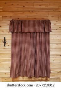 Check Curtain On The Wooden Wall With Hanger