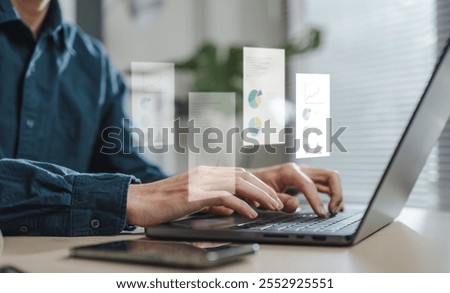 check, document, checklist, choice, guarantee, answer, assurance, certificate, choose, list. A man is typing on a laptop with a screen displaying graphs and charts.