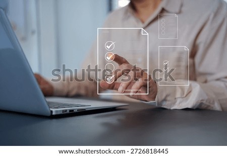 check, document, checklist, choice, guarantee, answer, assurance, certificate, choose, list. A man is pointing at a screen with a check mark and a thumbs up. Concept of approval or satisfaction.