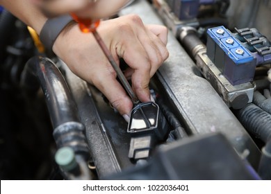 Check Engine Ignition System And Change The Ignition Coil. Car Care Service.