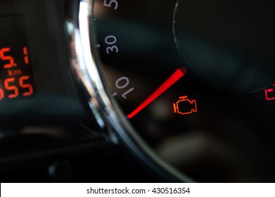 Check engine light. Car dashboard in closeup