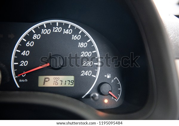 Check engine light and Oil pressure\
red light icon on car dashboard. fuel gauge alarm\
light.
