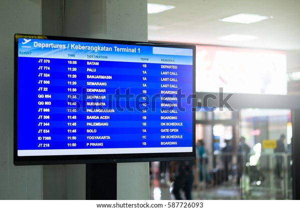 check-airport-departure-arrival-information-board-stock-photo-587726093