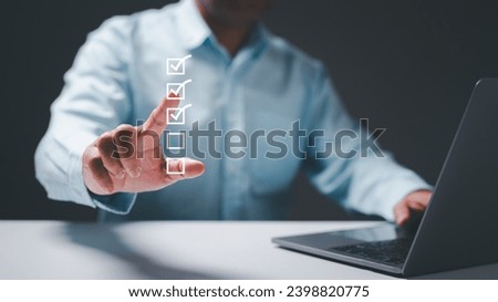 Check the list, then check the list against the screen before you check the box on a checklist, tick the touch option for a person using a computer and checkbox, with a hand marking the checkmark on a plan against a background as a man makes an online choice.
