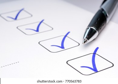 Check off completed tasks on a to-do list - Shutterstock ID 770563783