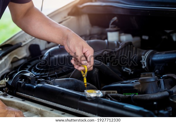 check the oil level in car\
engine