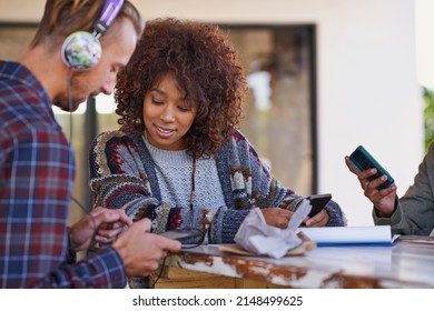 Check Out My New Playlist. A Young Woman Looking At Her Friends Playlist.