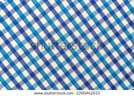 Check plaid seamless pattern. Blue, gray, black background in the cage