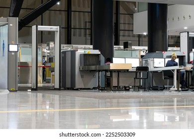 Check point. border control. Airport security metal detector scan. Empty scanner control luggage at the terminal. Gate-ray detection with a belt for scanning bags. - Shutterstock ID 2252503309