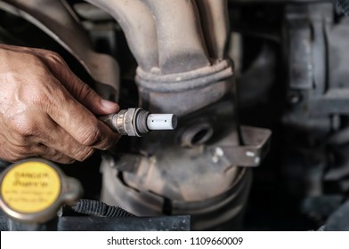 Check And Replace Oxygen Sensor By Car Technician.