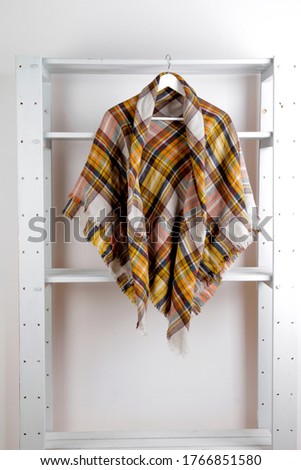 check scarf and yellow and white colors