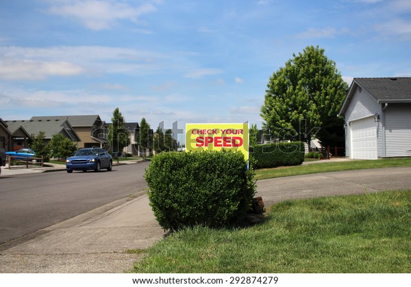 Check Your Speed sign in\
neighborhood