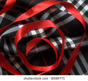 checked material and red ribbon