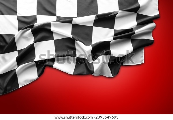 Checkered black\
and white flag on red\
background