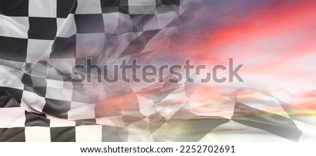 Checkered flag in bright sky
