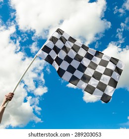Checkered flag waving in the wind - close up shot