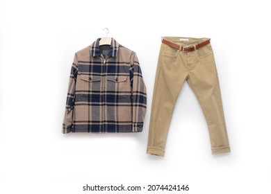 Checkered Paid Shirt Closeup With Khaki Pants Isolated On Hanger