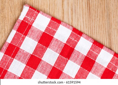 The Checkered Tablecloth On Wooden Table