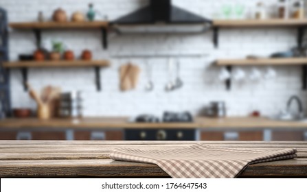 Checkered Towel On Wooden Table In Kitchen. Space For Text