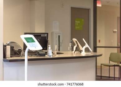 Check-in Kiosk Tablet Upon Arrival At Front Desk Of Test Center For Diagnostic Testing, Medical.