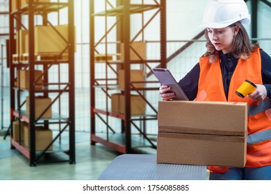 Checking the availability of products in the warehouse. Inventory of the warehouse. A girl with a barcode scanner and tablet checks the availability of goods.