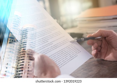 Checking a document in office (Lorem ipsum text used). multiple exposure