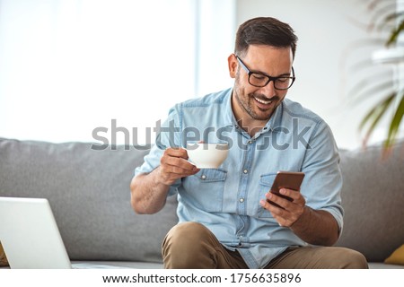 Similar – Image, Stock Photo Crop young man checking time on smart wristwatch