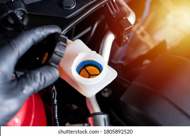 Checking The Level Of Car's Brake Fluid. Car Maintenance Concept.