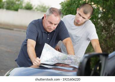 checking the map on the car