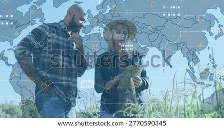 Checking tablet colleagues in plaid and denim with straw hat scanning corn field, with HUD overlay. Farmers, clipboard, worldmap, hexagon, datavisualization, crops, agriculture