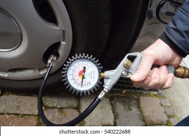 Checking Tire Pressure Of A Car