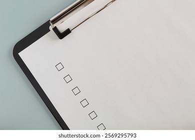 Checklist boxes close up on white paper, unchecked