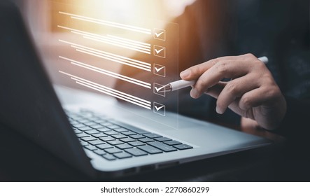 checklist and clipboard task documentation management, business people working laptop checklist questionnaire assessment form, online survey online exam Choosing the right answer in the exam  - Shutterstock ID 2270860299