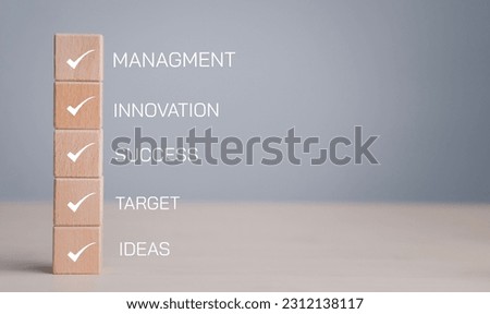 checklist and clipboard task documentation management with wood cubes with business background, Management,innovation and success ,Target business and Organisation structure concept.