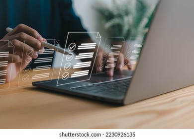 Checklist and clipboard task management, online survey form completion Corporate business technology includes a document management system (DMS) and process automation to efficiently manage files. - Shutterstock ID 2230926135