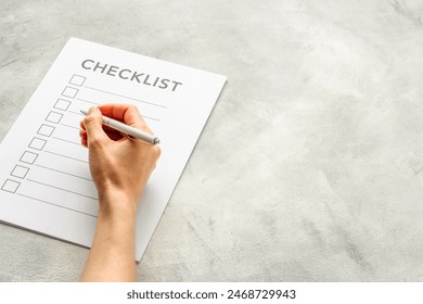 Checklist concept. Blank checklist with empty boxes on office table.