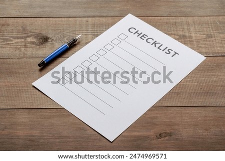 Checklist concept. Blank checklist with empty boxes on office table.