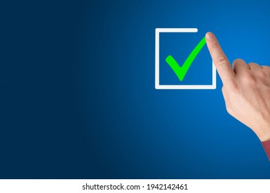 Checklist Concept, Businessman Checking Mark On The Check Boxes With Marker Green, Hand With A Finger Draws A Check Mark In Place For Marks. Human Hand Checking The Checklist Box. Copy Space