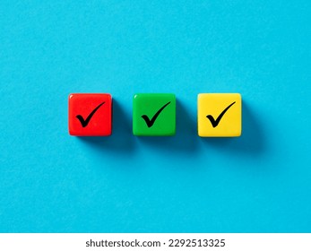 Checklist concept. Elections and Voting, Task list or task completion. Survey, and assessment concept. Check mark or tick symbols on colorful cubes.