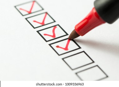 Checklist marked red with a red pen