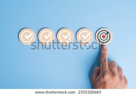 Checklist, Mission plan, Task list, Survey review, Quality control, Goals achievement, and Business success. To-do list for achieving targets. Hand point on target dartboard icons on wooden circles.