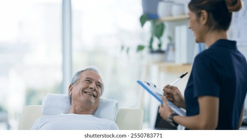 Checklist, physiotherapist and senior man in clinic for checkup on injury, accident or rehabilitation. Chiropractor, clipboard and healthcare worker with elderly male patient for medical report. - Powered by Shutterstock